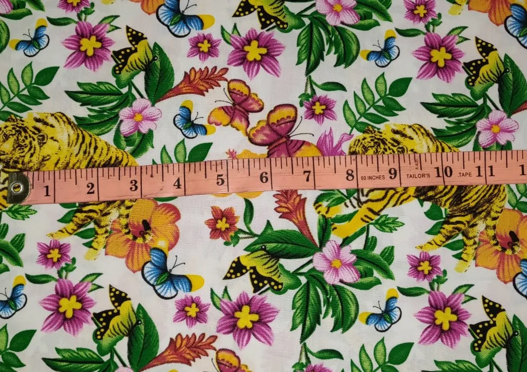 100% Cotton Poplin Print 58" wide available in two prints [ white floral jungle and black florall] [12804/05]
